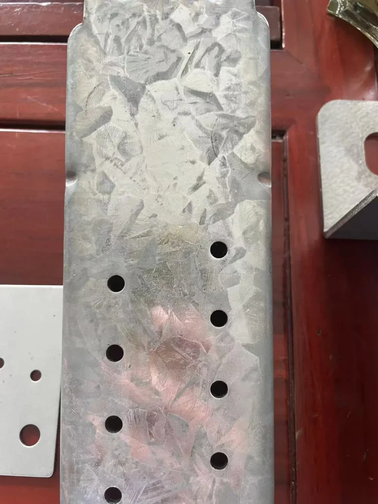 pHot-dip galvanized steel surface showing regular spangle crystalline pattern