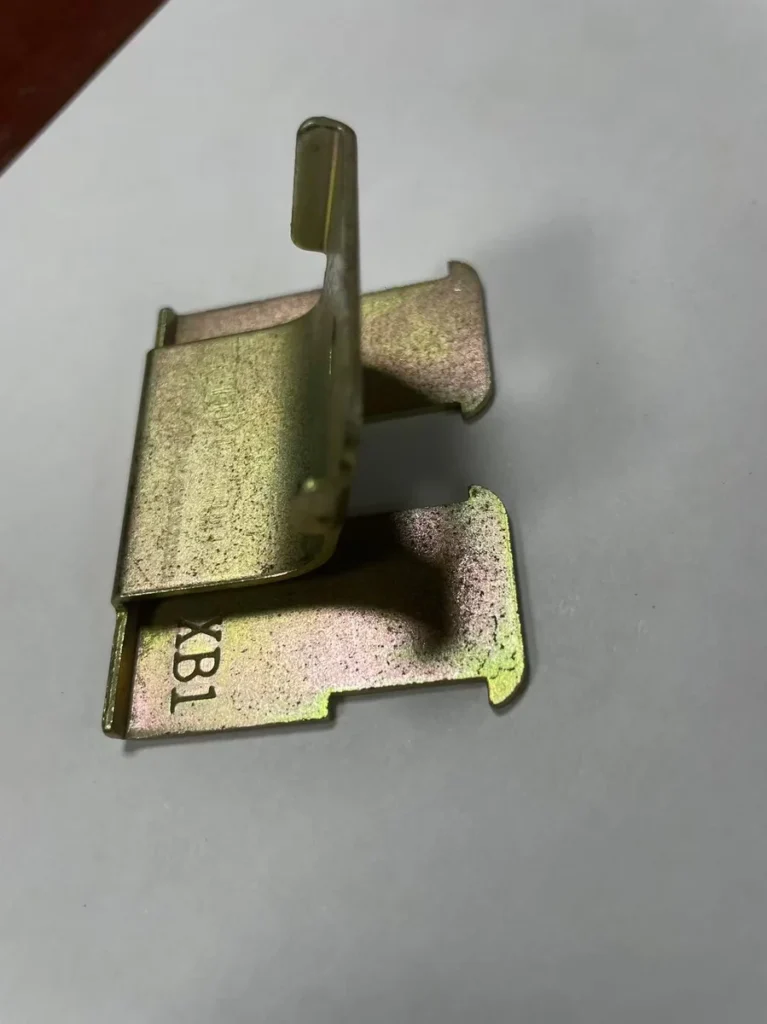 Custom motorcycle stamped bracket — color zinc plated