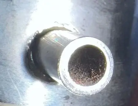 Close-up of rust particles inside a 304 stainless steel tube bore